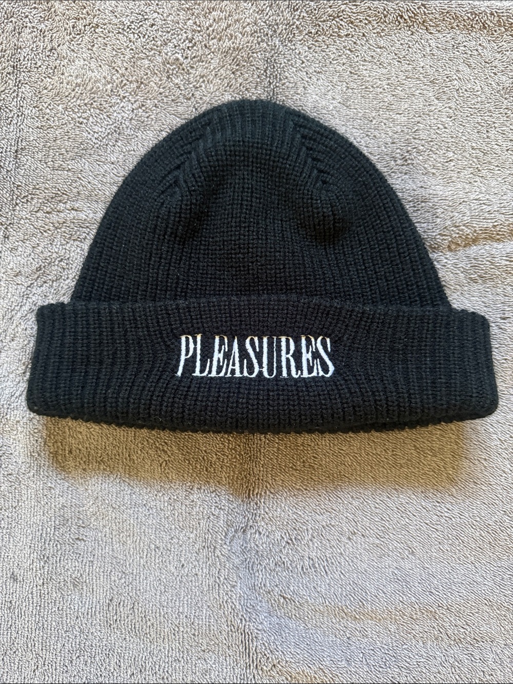 PLEASURES Black Knit Beanie with White Embroidered Logo